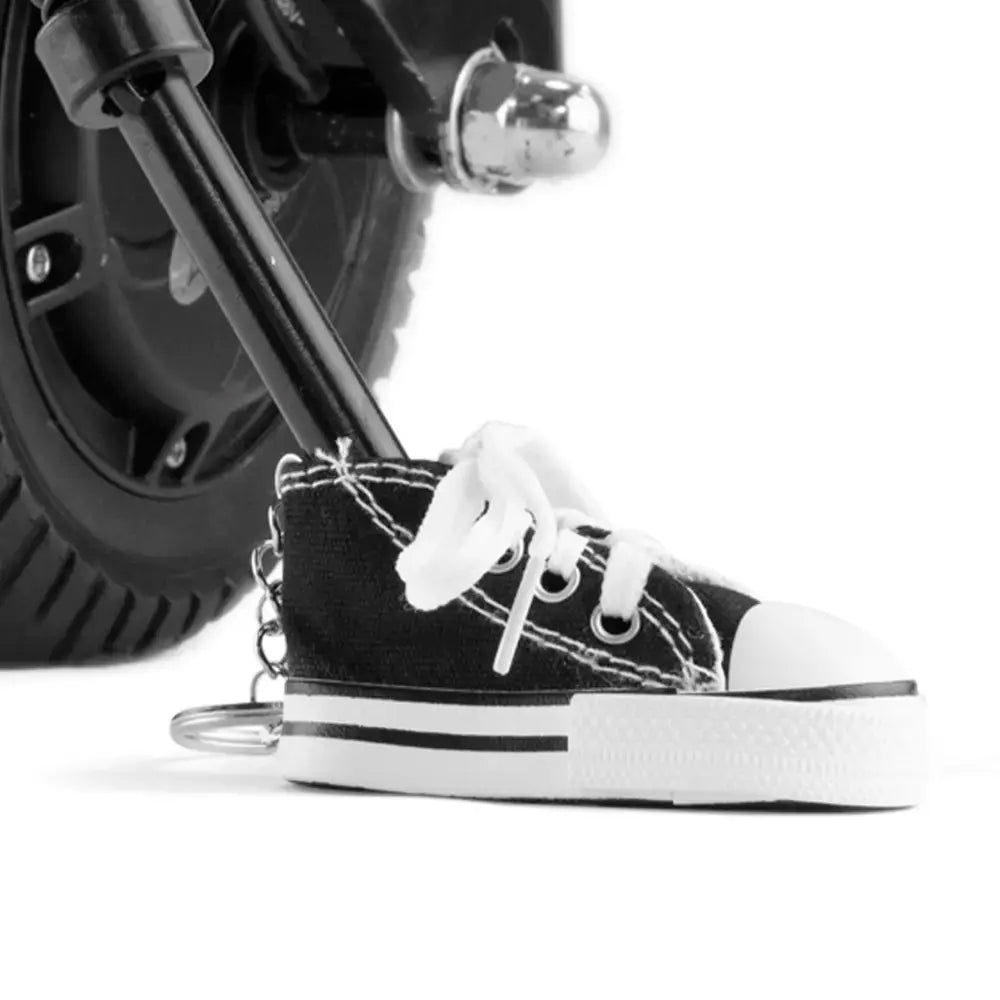 Black Converse Keychain On Scooter Kickstand